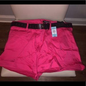 Red shorts with black belt